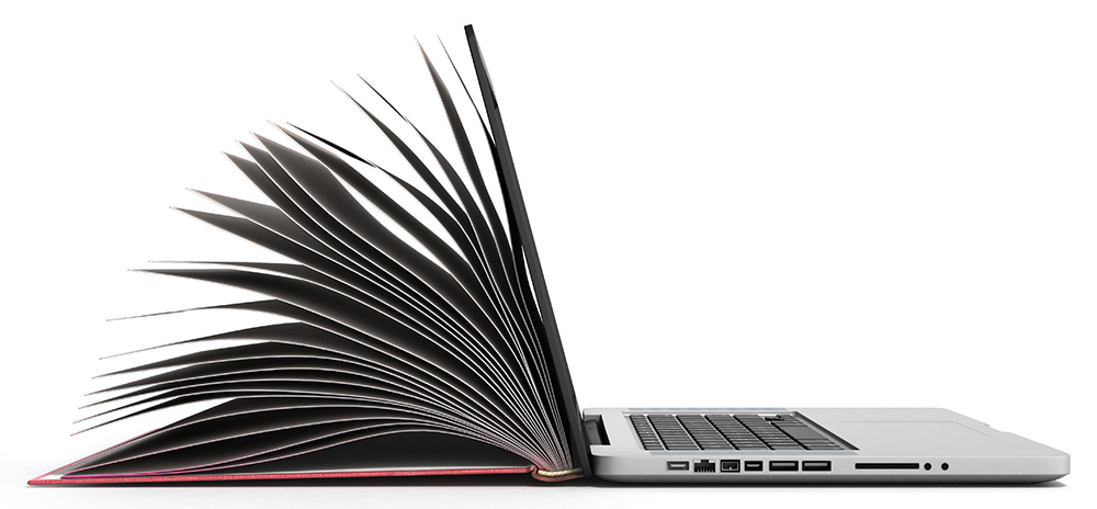 Buch und Laptop – die Verbindung von digital und Print